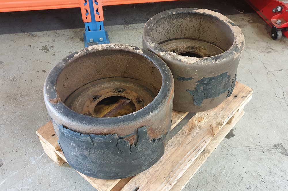 Before - Track reconditioning + mid-rollers, idler & drive wheel reco