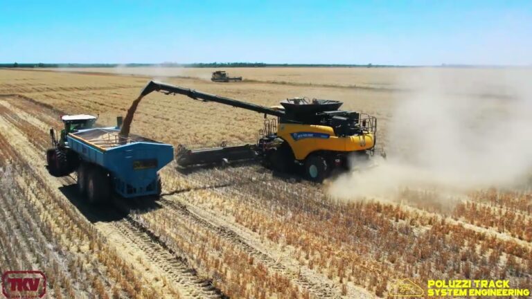 New Holland Combine Harvester wearing Poluzzi bolt on tracks